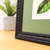 Corner of ornate wooden picture frame