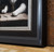 Close of up traditional print with black frame