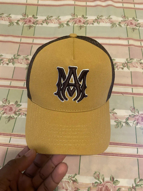 Amiri Vintage Yellow Trucker Hat with Iconic Logo Embroidery