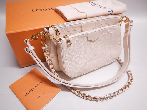 Louis Vuitton Multi Pochette Accessoires in creme Monogram canvas with creme leather trim, gold chain and jacquard stra