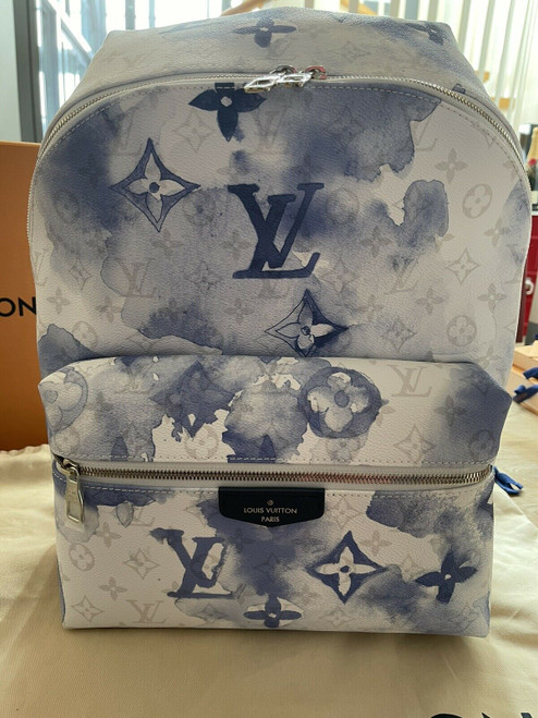 Louis Vuitton Discovery Backpack PM in Monogram Watercolor blue-and-white canvas with leather trim and silver-tone hardware
