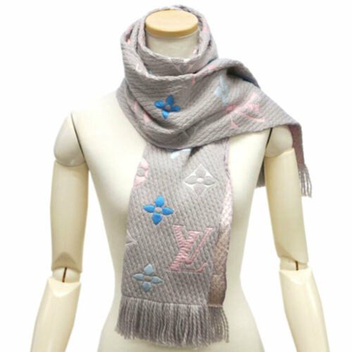 Brand new, authentic Louis Vuitton Echarpe Logomania scarf (M75874) in sophisticated gray wool and silk blend, featuring the iconic LV monogram, presented with its original box