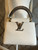 Stunning Louis Vuitton Capucines Handbag in Snow White Taurillon Leather – Exotic Python Details, Luxury Design