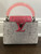 Louis Vuitton Capucines Mini - Rare Pink Acrylic Handle Detail