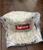 Supreme SS25 tan beige military camp cap with embroidered logos and adjustable strap