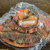 Use descriptive alt text: "Authentic Supreme SS24 Canvas Boonie Hat Orange Camo front view