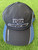 Close up embroidered Supreme Fox Racing logos on navy hat
