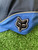 Close up embroidered Supreme Fox Racing logos on navy hat