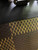 Close up LV Nigo Turtle graphic LV Made pouch,