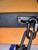 Close up black chain detail Virgil Abloh LV belt