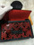 Louis Vuitton Dauphine Chain Wallet – Black Lace Monogram with Red Leather, Authentic, Brand New