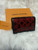Louis Vuitton Dauphine Chain Wallet – Black Lace Monogram with Red Leather, Authentic, Brand New