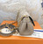 Louis Vuitton Empreinte Monogram Giant Favorite in Tourterelle and Crème with gold-tone hardware