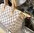 Louis Vuitton Speedy 25 Damier Azur canvas handbag with rolled leather handles and engraved padlock