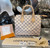 Louis Vuitton Speedy 25 Damier Azur canvas handbag with rolled leather handles and engraved padlock