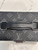 Close-up of Louis Vuitton Fragrance Accessory Eclipse Trunk handle and closure