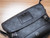 Adjustable leather shoulder strap and iridescent hardware on LV Fragment Apollo Messenger PM