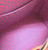 Close‑up of Yayoi Kusama pumpkin motif on Monogram canvas