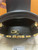 Front view of Louis Vuitton Capucines Mini M56669 in black Taurillon leather with gold Monogram Flower crown