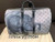 Front view of Louis Vuitton Keepall Bandoulière 45 M54130 in Monogram Savannah canvas with Chapman Brothers elephant print