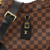 Louis Vuitton Damier Ebene Odeon PM messenger bag in coated canvas with black leather trim and adjustable strap