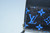 Louis Vuitton Digit Bleu Zippy Wallet M67235 in blue and black Monogram canvas with silver-tone zip closure