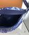 Louis Vuitton Discovery Bumbag PM M20587 in blue Monogram Bandana calf leather with front and back zip pockets