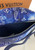 Louis Vuitton Discovery Bumbag PM M20587 in blue Monogram Bandana calf leather with front and back zip pockets