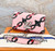 Louis Vuitton Épi Chain Flower Print Twist Chain Wallet in bubblegum pink with silver LV Twist lock and chain strap