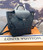 Louis Vuitton Montsouris NM backpack in black Monogram Empreinte calfskin with brass buckle closure and adjustable leather straps