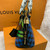 "Louis Vuitton Épi Damier Race Alma BB in blue and green checkered leather with silver-tone hardware and removable straps