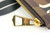 Louis Vuitton Damier Ebene LV Logo Pochette 91LK412S in brown canvas with pink Louis Vuitton logo