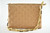 Louis Vuitton Coussin PM handbag in cream Monogram-embossed puffy lambskin with gold-tone chain and leather strap