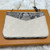 Louis Vuitton Double Zip Pochette N96322 in white Monogram Empreinte leather with silver zippers and chain strap