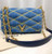 Louis Vuitton Twist MM shoulder bag in denim blue Épi leather with gold LV Twist-lock closure and removable silver chain-and-leather strap