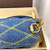 Louis Vuitton Twist MM shoulder bag in denim blue Épi leather with gold LV Twist-lock closure and removable silver chain-and-leather strap