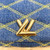 Louis Vuitton Twist MM shoulder bag in denim blue Épi leather with gold LV Twist-lock closure and removable silver chain-and-leather strap