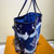 Louis Vuitton Escale Neverfull MM tote bag in blue tie-dye Monogram canvas with cowhide-leather trim and detachable pouch