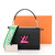 Louis Vuitton Twist MM Épi leather shoulder bag in black with rose-pink glazed edges, hot-pink LV Twist-lock, and silver chain strap