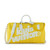 Louis Vuitton Keepall Bandoulière 50 in bright yellow grained leather with white trim and yellow LV-monogram acetate chai