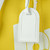 Louis Vuitton Keepall Bandoulière 50 in bright yellow grained leather with white trim and yellow LV-monogram acetate chai