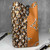 100% Authentic Louis Vuitton Monogram Giant Jungle NéoNoé Caramel MM – Limited-Edition 2019 Bucket Bag with Brass Hardware & Orange Microfiber Lining