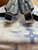 Louis Vuitton Discovery Backpack PM in Monogram Watercolor blue-and-white canvas with leather trim and silver-tone hardware