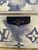 Louis Vuitton Discovery Backpack PM in Monogram Watercolor blue-and-white canvas with leather trim and silver-tone hardware