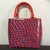 Louis Vuitton Alma BB in red Vernis patent leather with raised jungle dot accents and silver-tone hardware