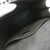 Gold S-lock closure detail on LV Spring Street bag