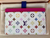 Front view of Louis Vuitton x Takashi Murakami Multicolor Card Holder M13403