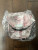 Full view Supreme pink camo 6‑panel cap with tags