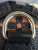 Louis Vuitton LV × TM Nano Speedy bag in black Monogram Multicolor canvas with rainbow Takashi Murakami motifs and gold hardware.