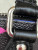 Louis Vuitton LV × TM Nano Speedy bag in black Monogram Multicolor canvas with rainbow Takashi Murakami motifs and gold hardware.